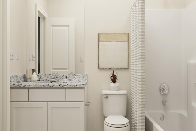 bathroom with shower / bath combo with shower curtain, toilet, and vanity