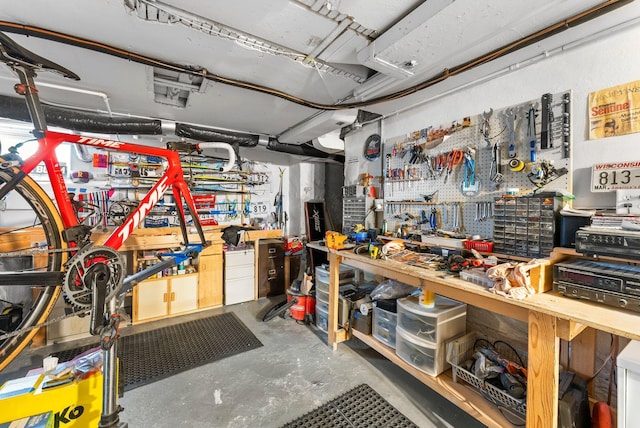 garage with a workshop area