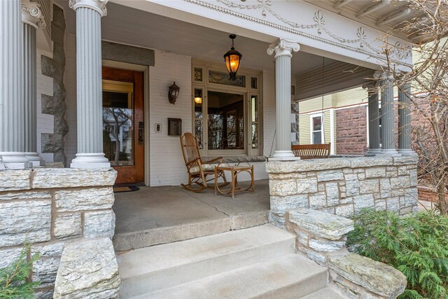 property entrance featuring a porch