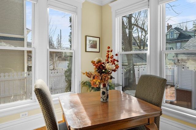 dining room featuring ornamental molding