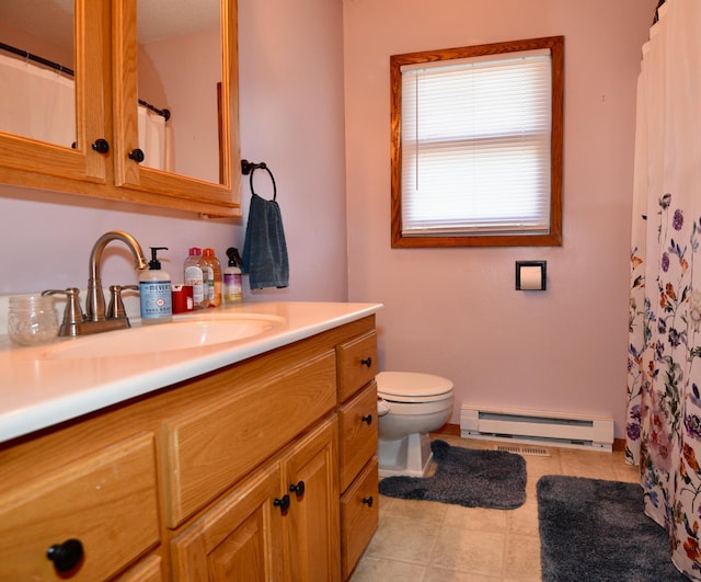 bathroom featuring a baseboard radiator, toilet, vanity, and tile patterned flooring