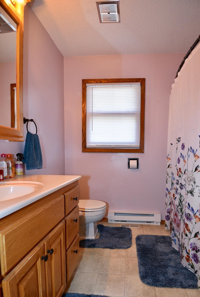 full bath featuring tile patterned floors, visible vents, toilet, a baseboard heating unit, and vanity