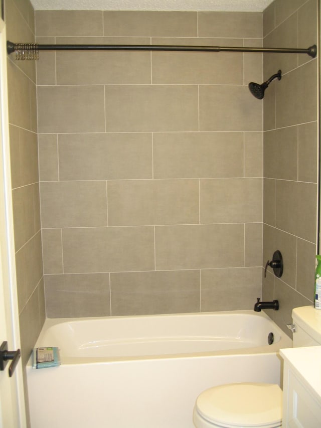 full bathroom with shower / bathing tub combination, vanity, and toilet