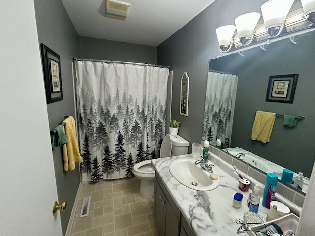 bathroom featuring toilet, curtained shower, visible vents, and vanity