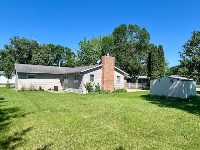 1006 10th St SW, Wadena, MN 56482 - back of property featuring a chimney