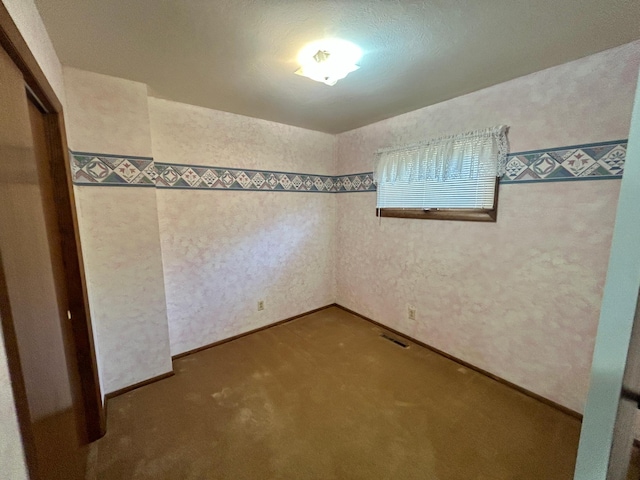 1006 10th St SW, Wadena, MN 56482 - unfurnished room with carpet flooring and baseboards