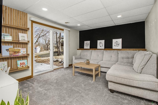 living area with recessed lighting, baseboards, and carpet floors