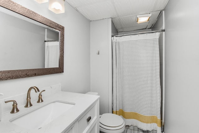 bathroom with a shower with shower curtain, toilet, and vanity