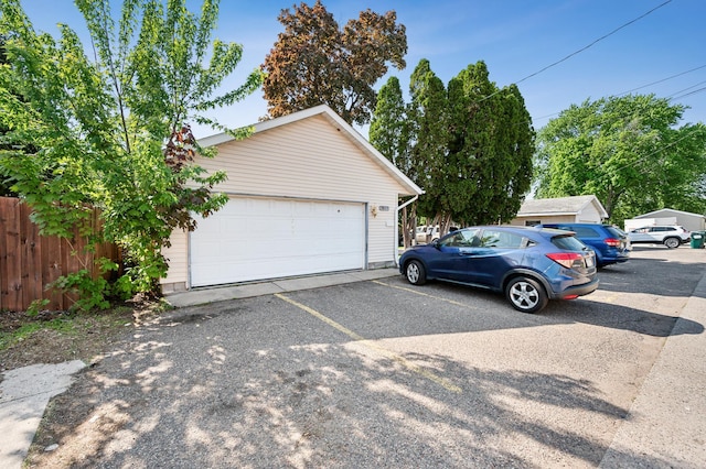 detached garage with fence