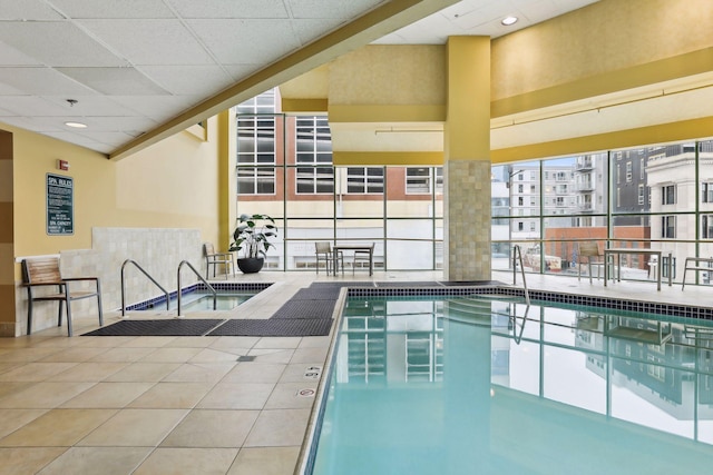 pool featuring an indoor in ground hot tub