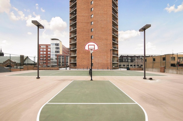 view of sport court with community basketball court and fence