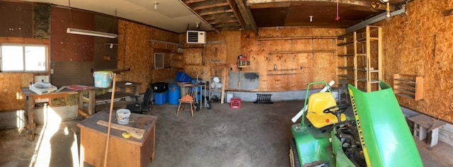 garage with a workshop area