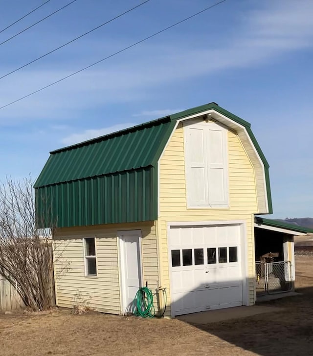 garage featuring driveway