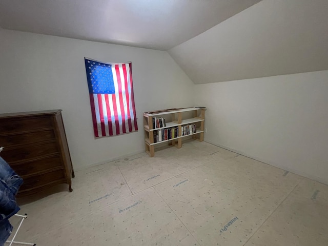 bonus room featuring vaulted ceiling