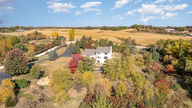 birds eye view of property featuring a rural view