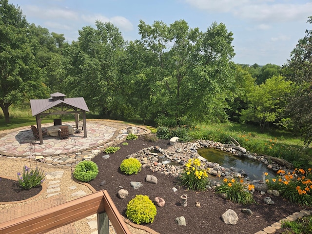 view of yard with a gazebo and a patio