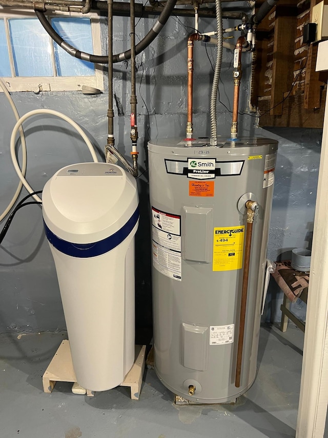 utility room with electric water heater