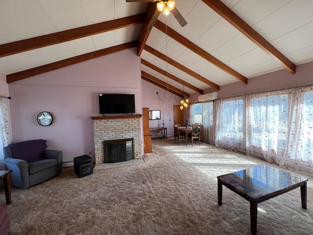 living area with an AC wall unit, beamed ceiling, carpet, and a brick fireplace