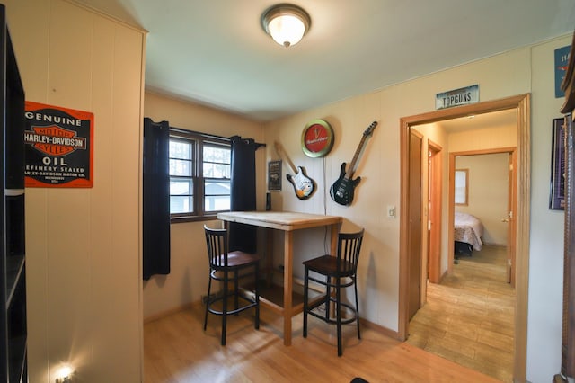 61279 US Highway 169, Hill City, MN 55748 - dining room featuring a bar and light wood finished floors