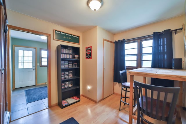 61279 US Highway 169, Hill City, MN 55748 - dining room featuring baseboards and light wood-style floors