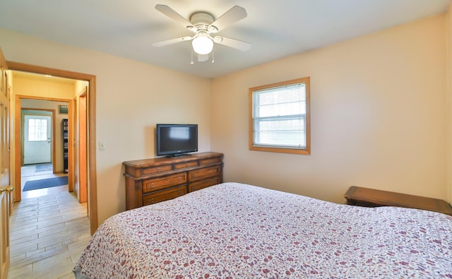 61279 US Highway 169, Hill City, MN 55748 - bedroom featuring a ceiling fan and light wood finished floors