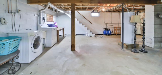 61279 US Highway 169, Hill City, MN 55748 - basement featuring washer and clothes dryer and stairs