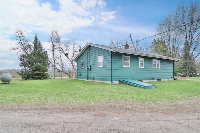 61279 US Highway 169, Hill City, MN 55748 - view of side of property with a lawn and a chimney
