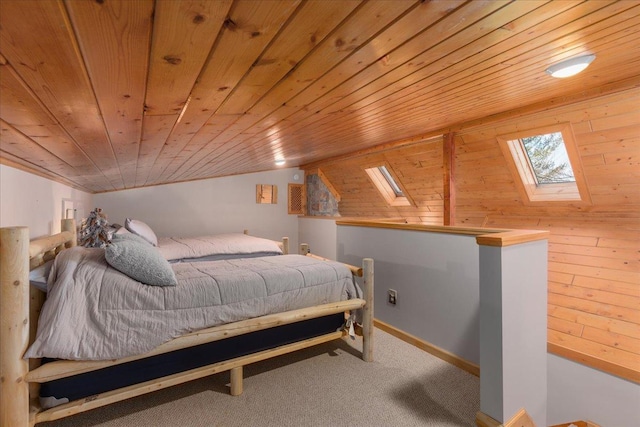 bedroom featuring vaulted ceiling with skylight, wooden ceiling, wooden walls, baseboards, and carpet