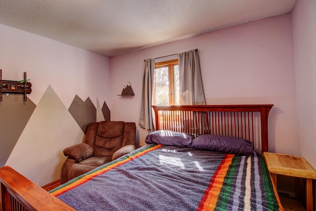 bedroom featuring a textured ceiling