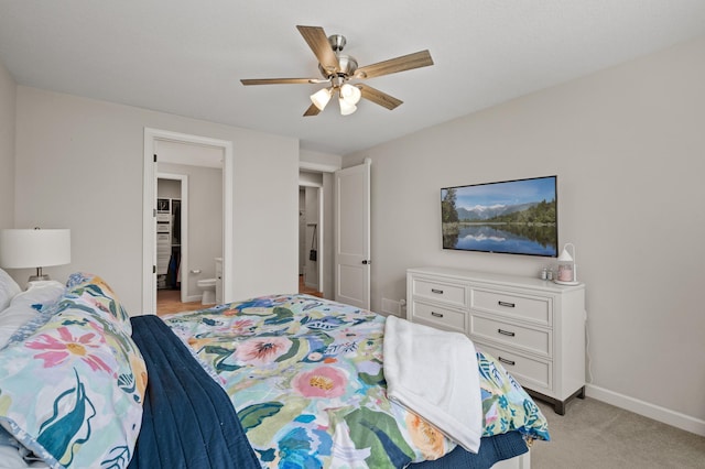 bedroom with light carpet, baseboards, and a ceiling fan