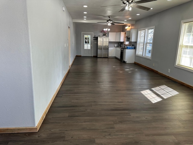 unfurnished living room with recessed lighting, baseboards, dark wood-style floors, and a ceiling fan