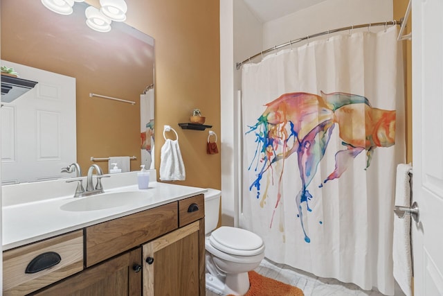 270 4th St E Unit 401, Saint Paul, MN 55101 - bathroom with vanity, toilet, and a shower with curtain