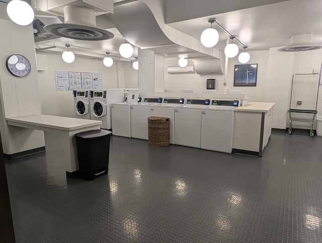 shared laundry area featuring washer and dryer