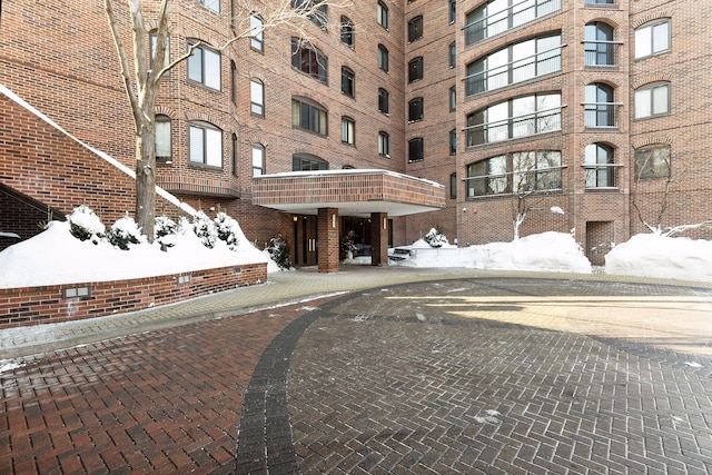 view of snow covered property