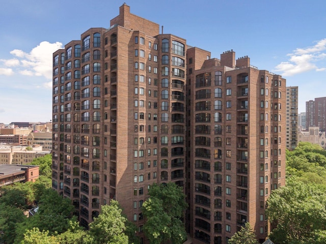 view of building exterior featuring a view of city