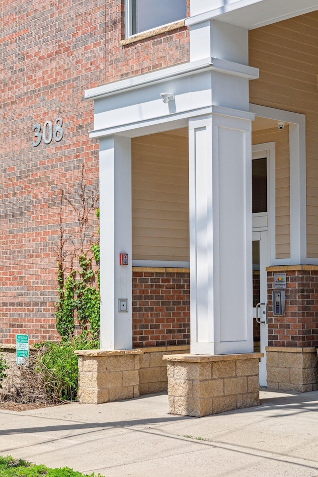 308 18th St Unit 101, Minneapolis, MN 55404 - property entrance featuring brick siding
