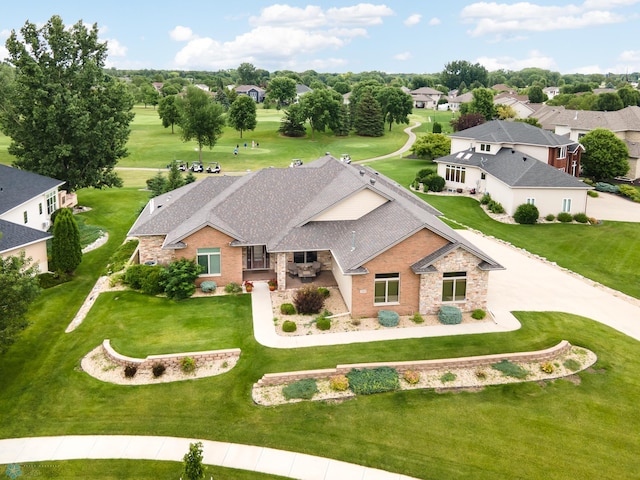 drone / aerial view with a residential view