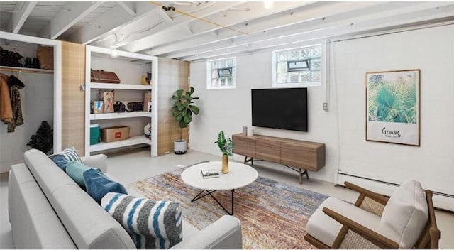 living area with finished concrete flooring