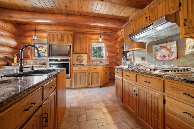 kitchen featuring wooden ceiling, appliances with stainless steel finishes, beamed ceiling, under cabinet range hood, and a sink