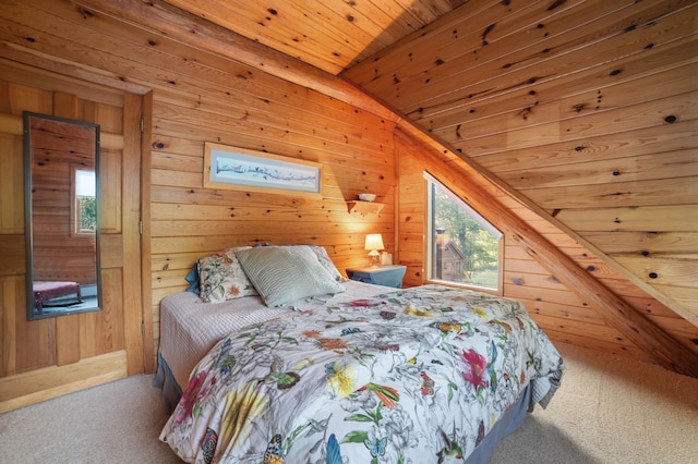 bedroom featuring wood ceiling, wooden walls, vaulted ceiling, and carpet flooring