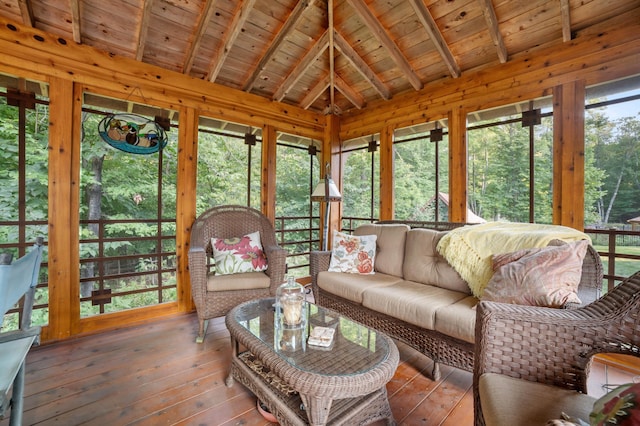 sunroom with wood ceiling and lofted ceiling with beams