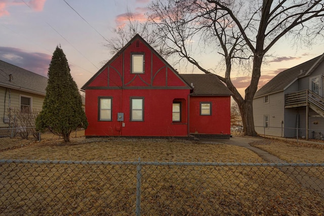 view of home's exterior featuring fence