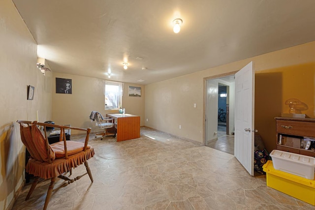 office area with stone finish floor