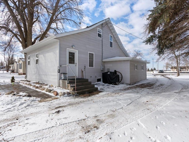 view of snow covered property