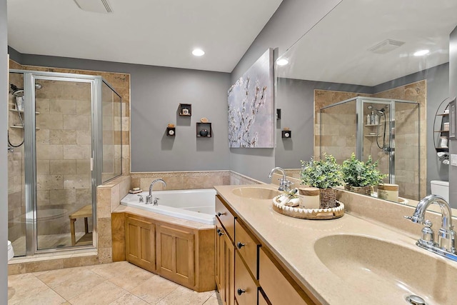 full bathroom featuring a sink, visible vents, a garden tub, and a stall shower