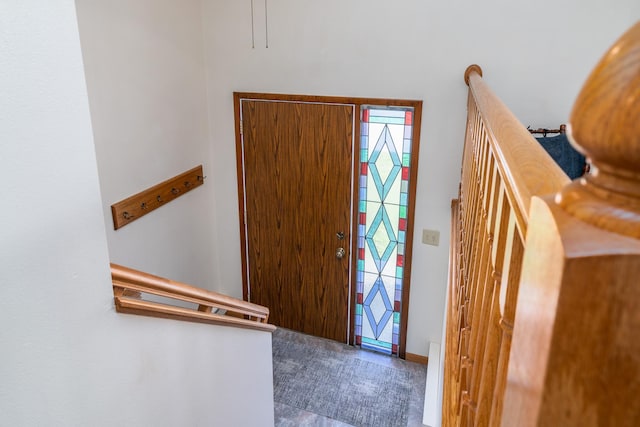 entrance foyer featuring carpet flooring