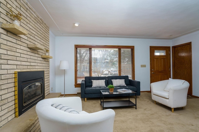 living room with baseboards, light colored carpet, and a fireplace