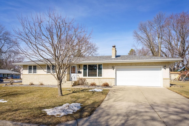 single story home featuring an attached garage, driveway, a chimney, and a front lawn