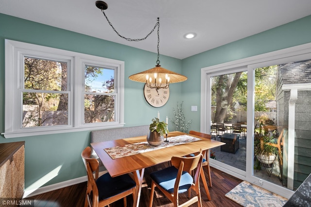 dining space featuring recessed lighting, dark wood finished floors, and baseboards