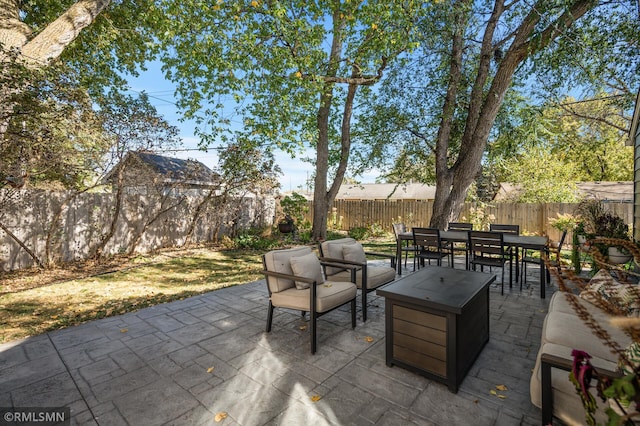 view of patio / terrace featuring a fenced backyard and outdoor dining space